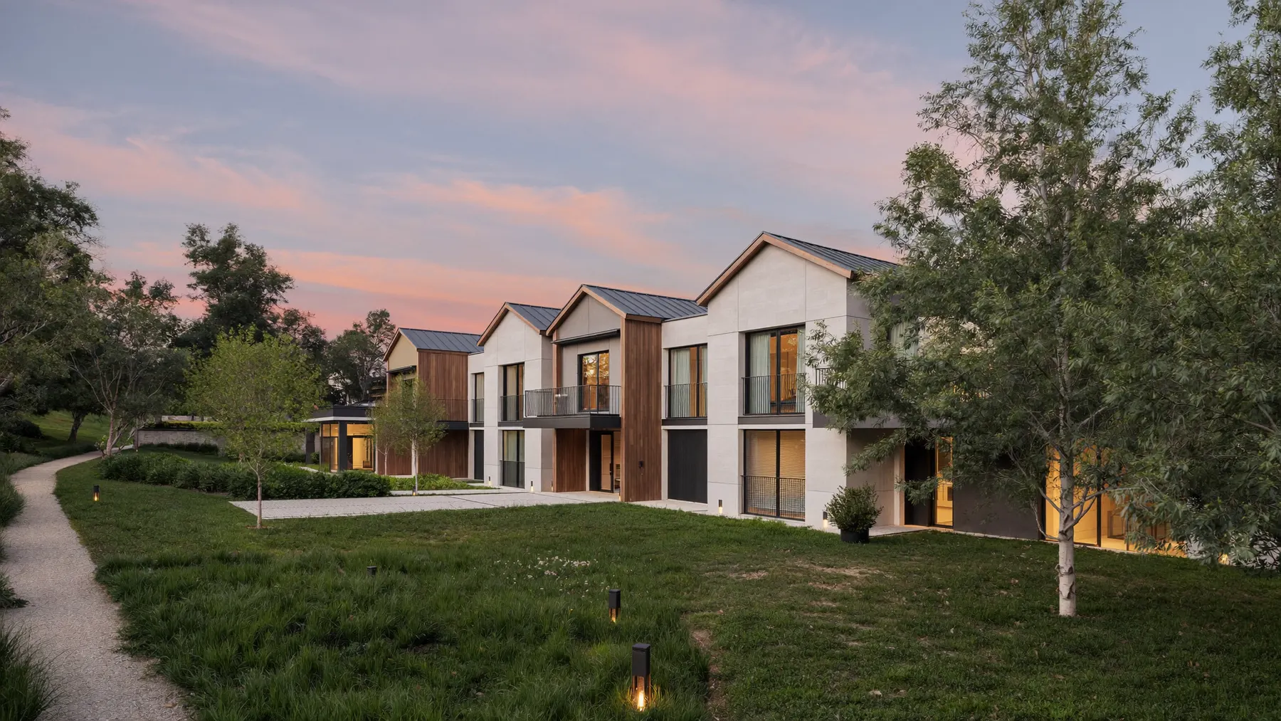 Townhouses beside parkland in Karawara